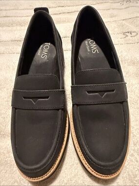 TOMS Black Men’s Penny Loafers with Tan Trim